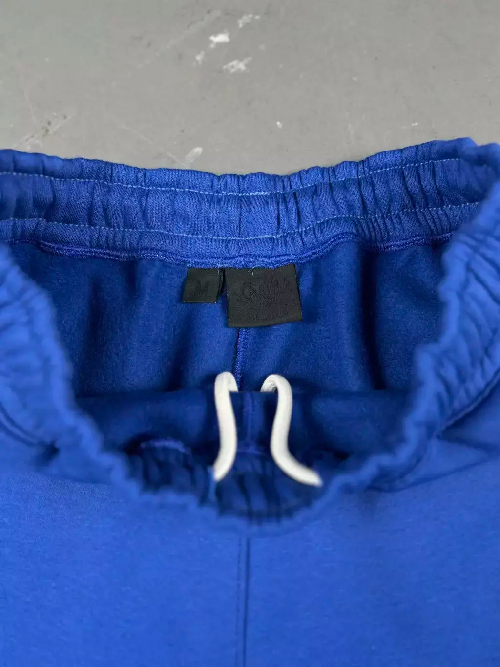 CONJUNTO SYNA WORLD LOGO BLUE