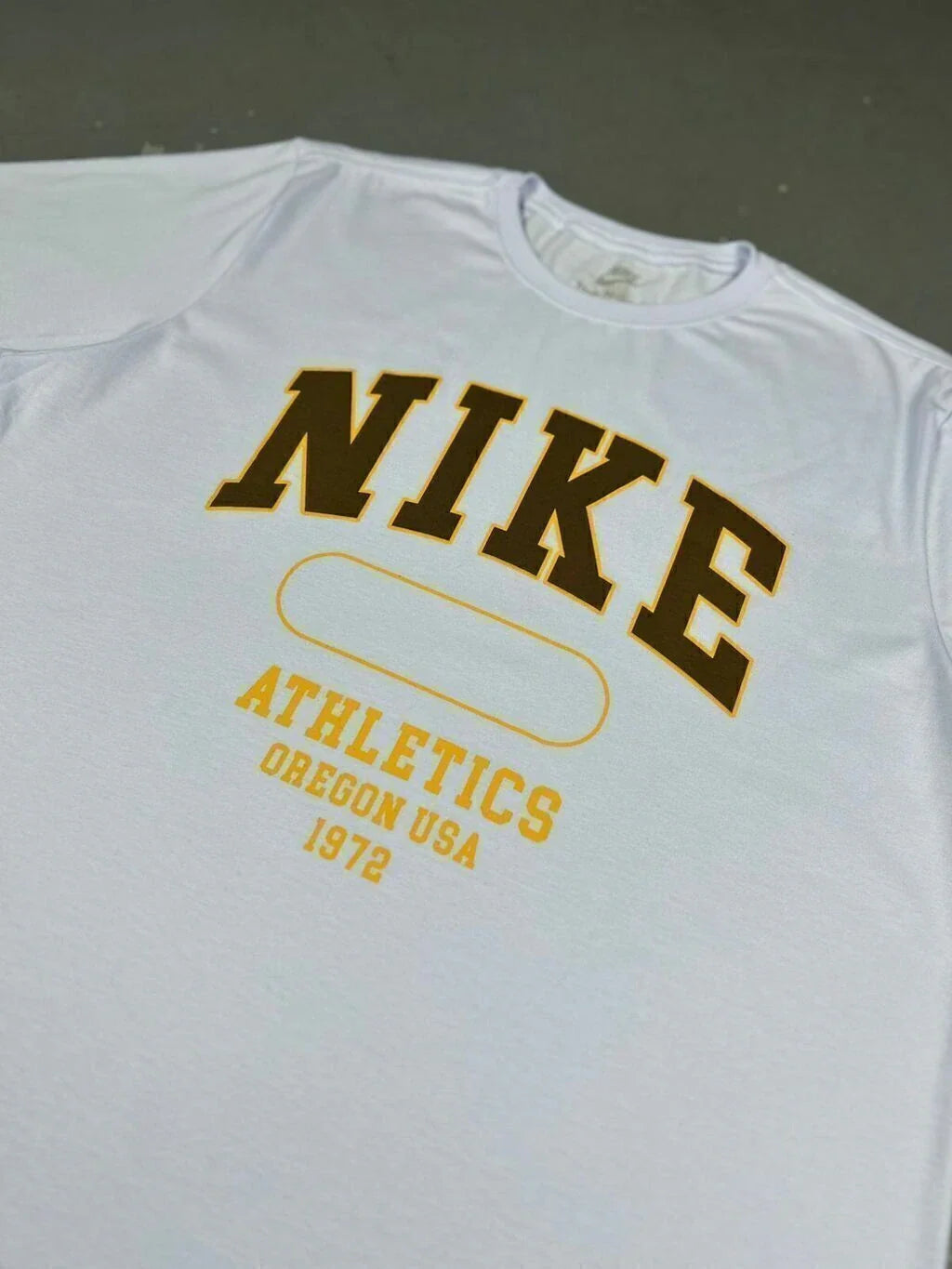 CAMISETA NK ATHLETICS LETTER