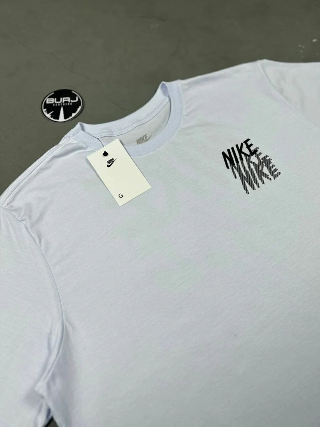 CAMISETA NK REPEAT FADE