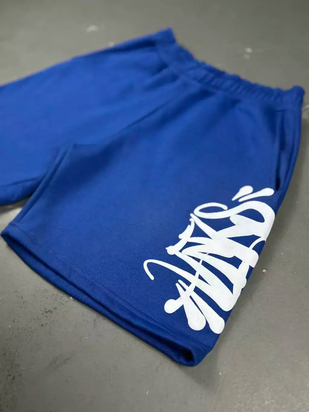CONJUNTO SYNA WORLD LOGO BLUE