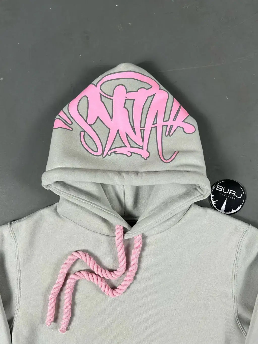 CONJUNTO SYNA WORLD LOGO