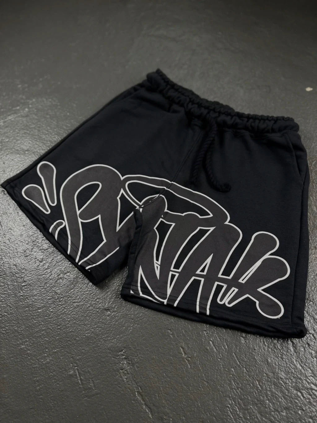 CONJUNTO SYNA WORLD LOGO