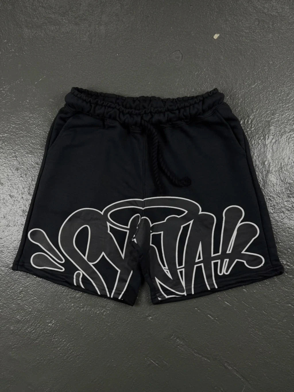 CONJUNTO SYNA WORLD LOGO