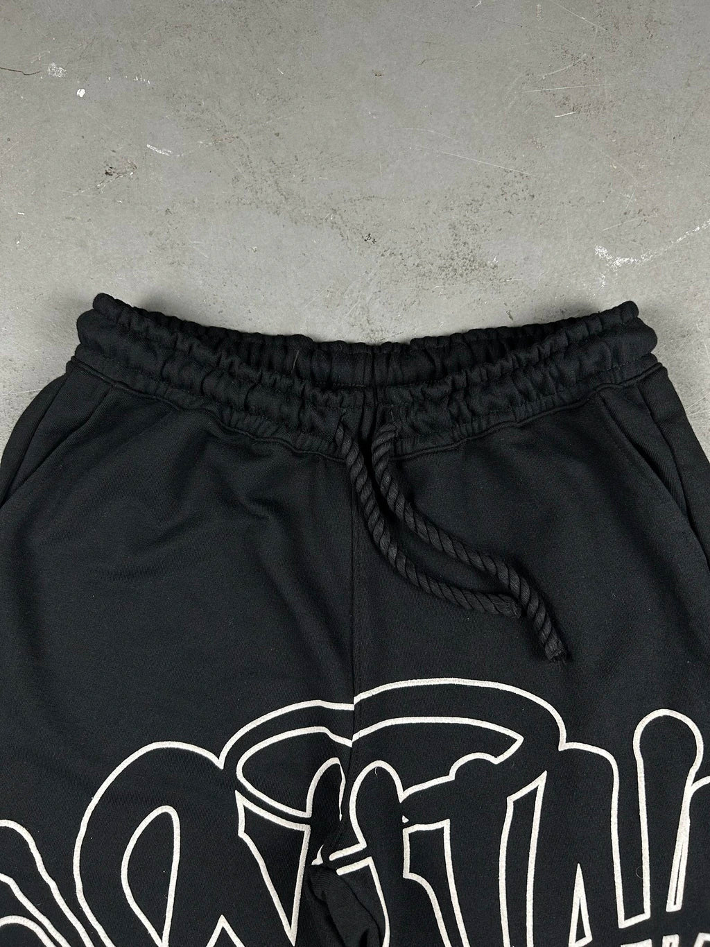 CONJUNTO SYNA WORLD LOGO