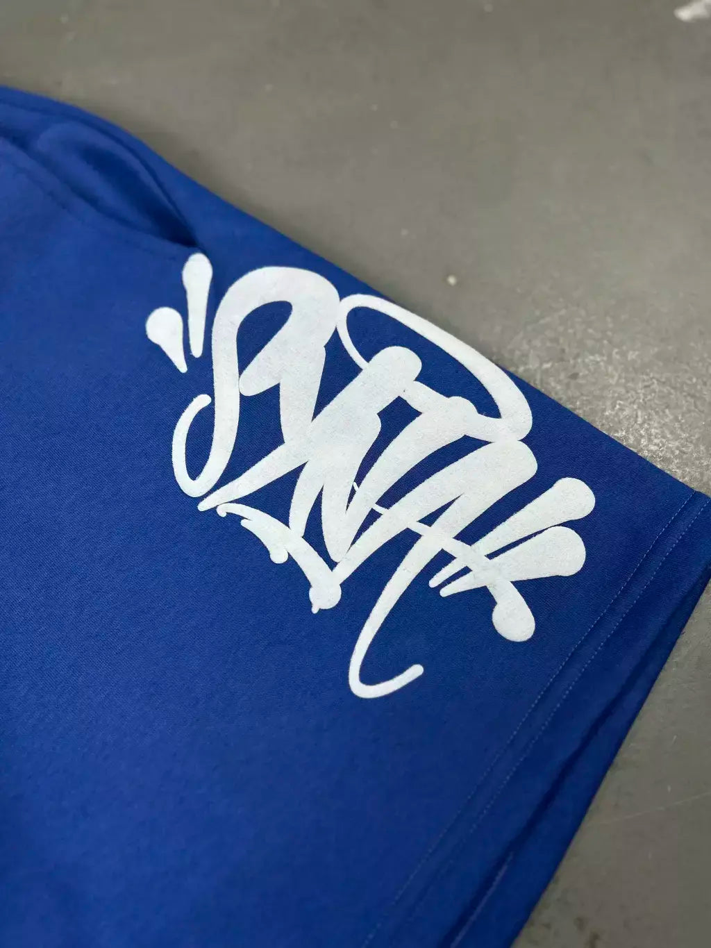 CONJUNTO SYNA WORLD LOGO BLUE