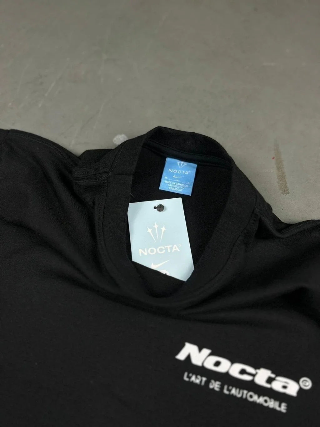CAMISETA NK X NOCTA L’ART