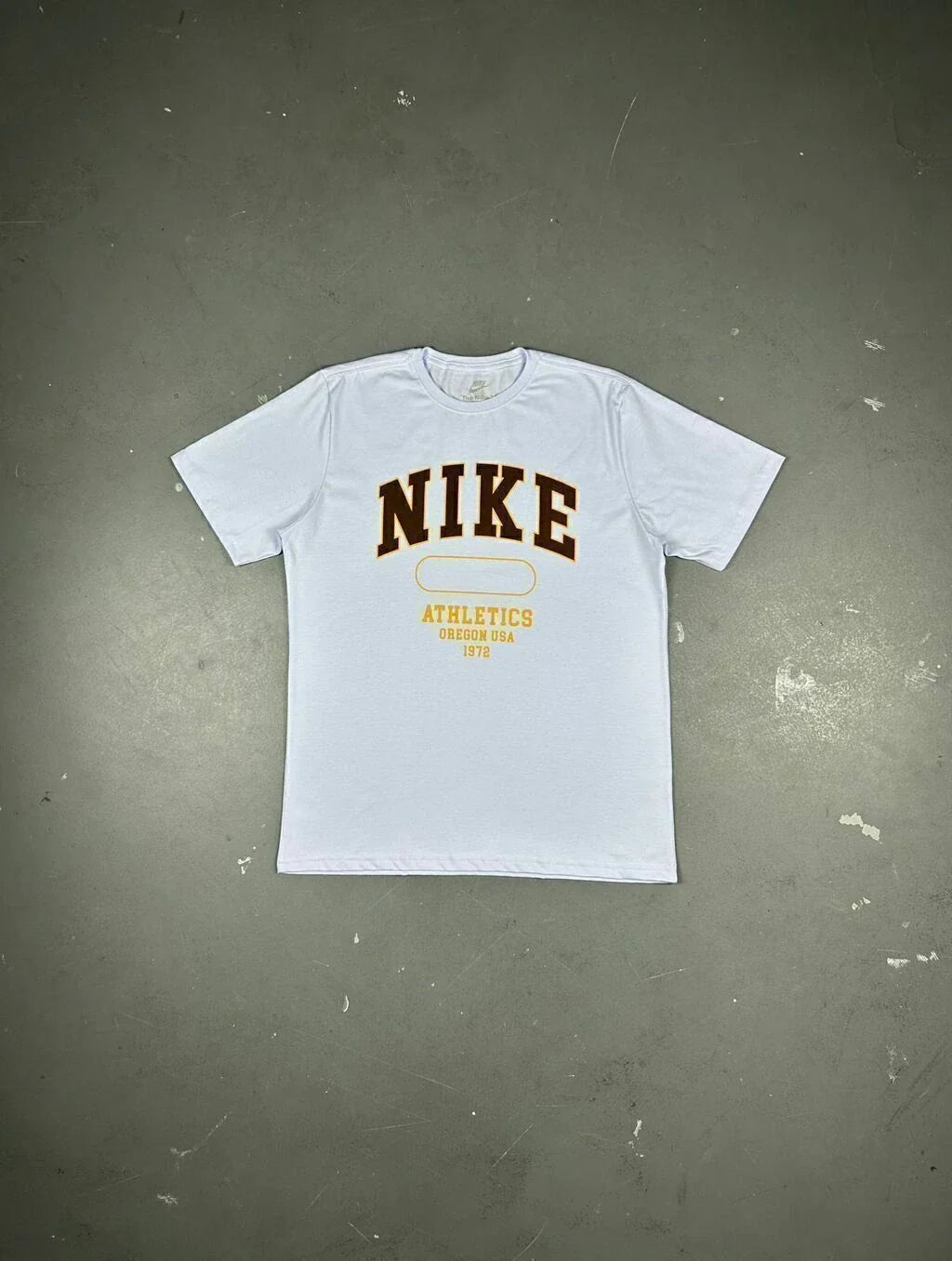 CAMISETA NK ATHLETICS LETTER