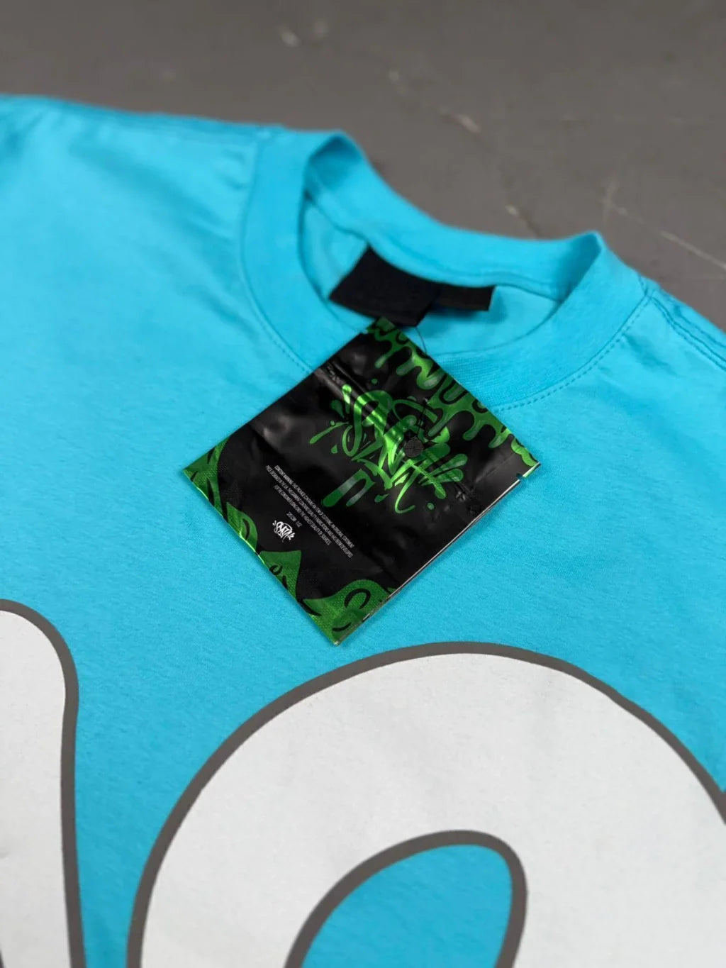 CONJUNTO SYNA WORLD LOGO